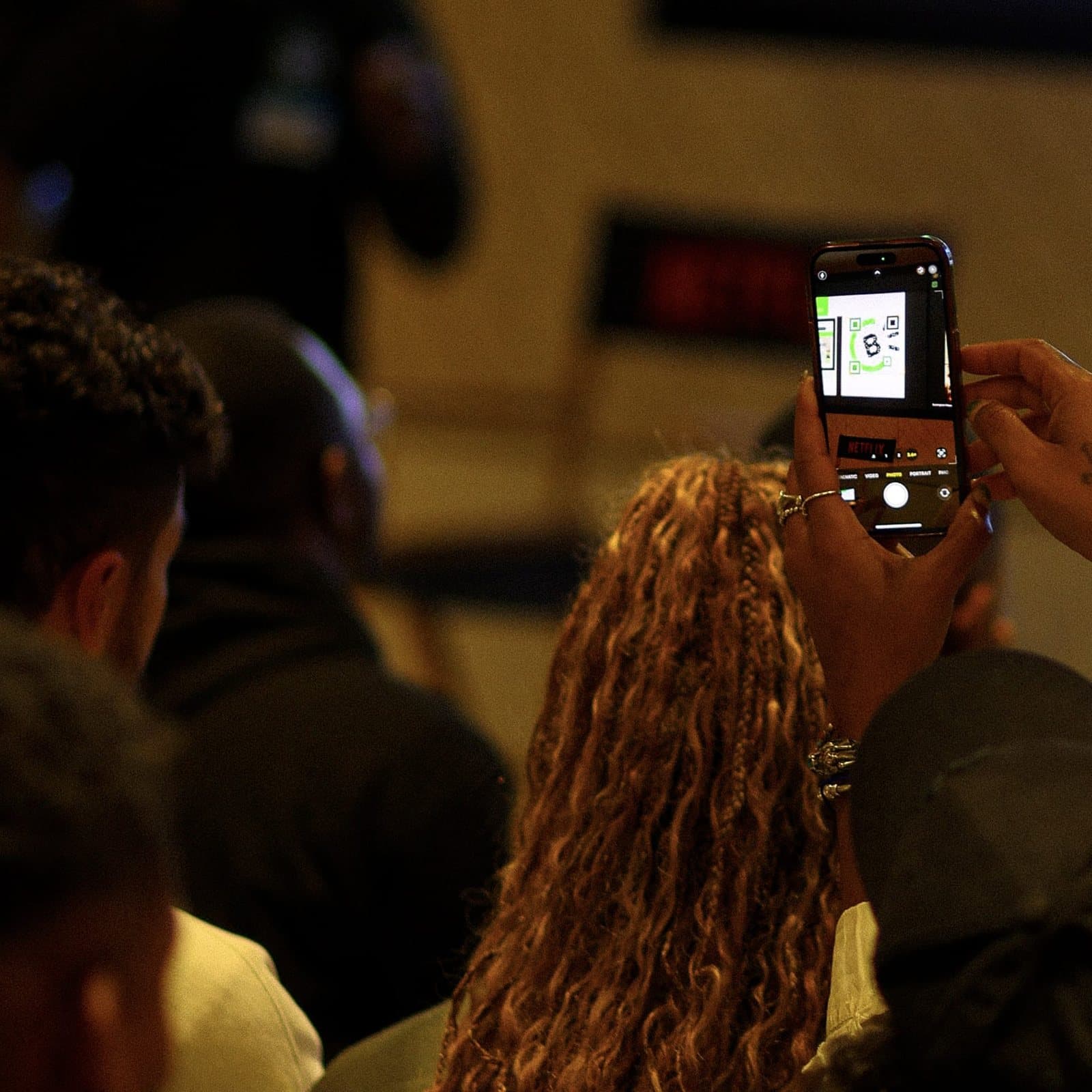Scanning the CashBlack QR code at one of our events